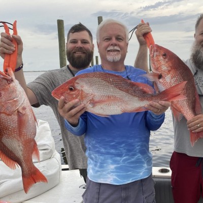 a person holding a fish