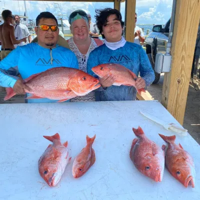 a person holding a fish